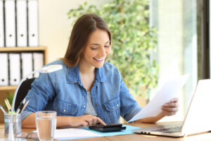 woman making estimated tax payments