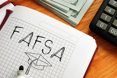 FAFSA image with money and calculator